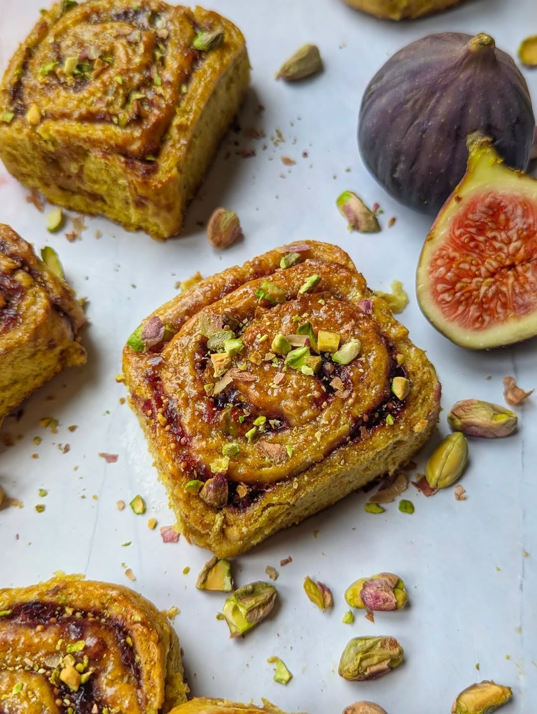 Pumpkin Bread Rolls With Figs, Pistachio, And A Rosewater Glaze